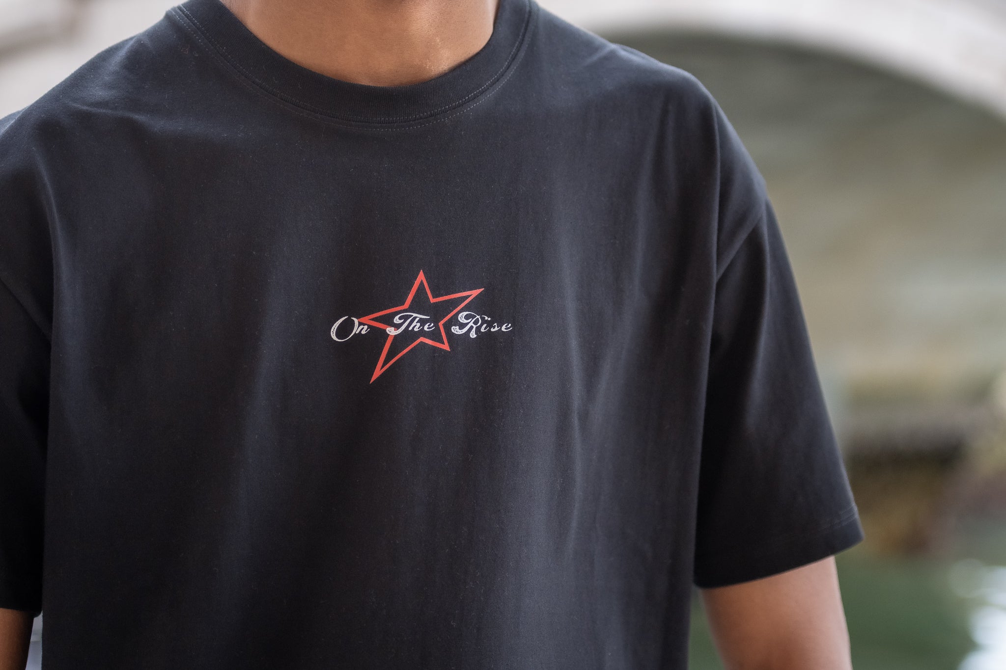 tee rising stars black